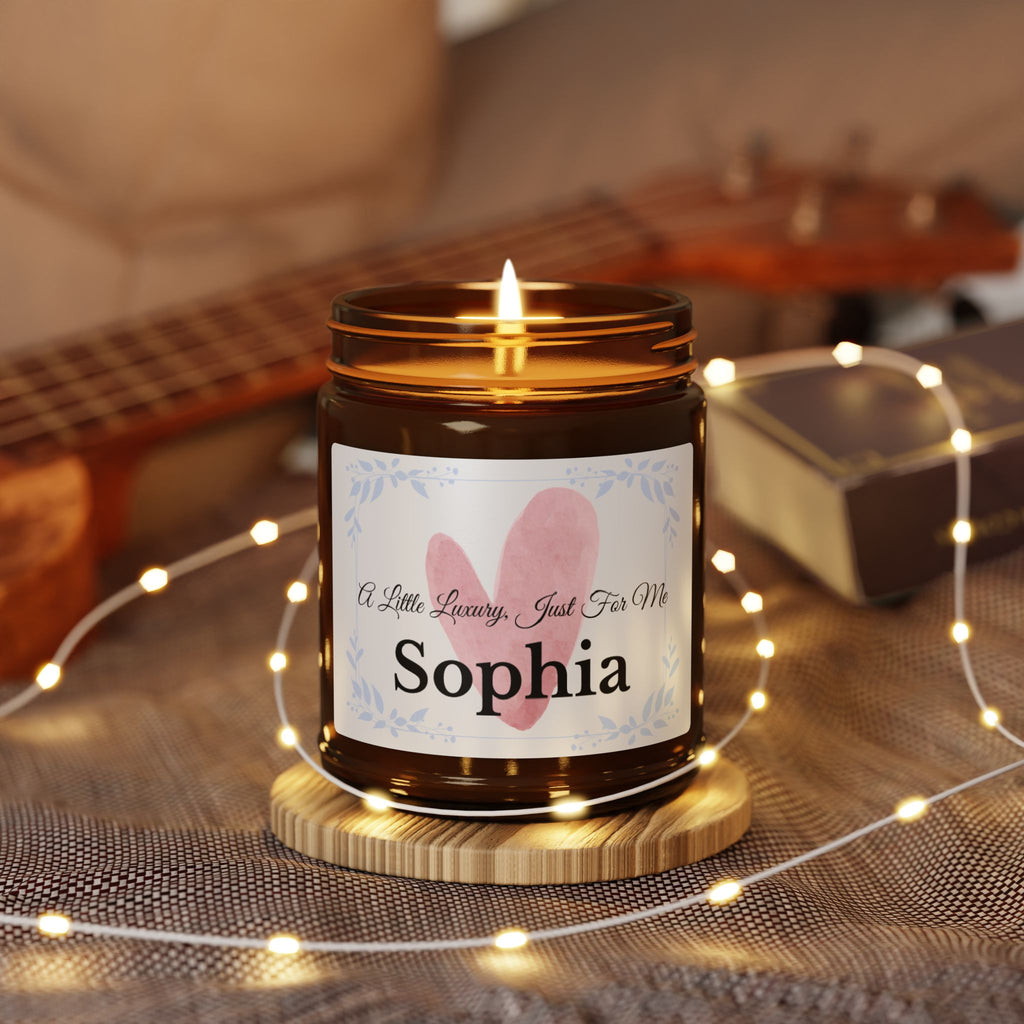 Close-up of personalised candle label with watercolour heart and botanical frame