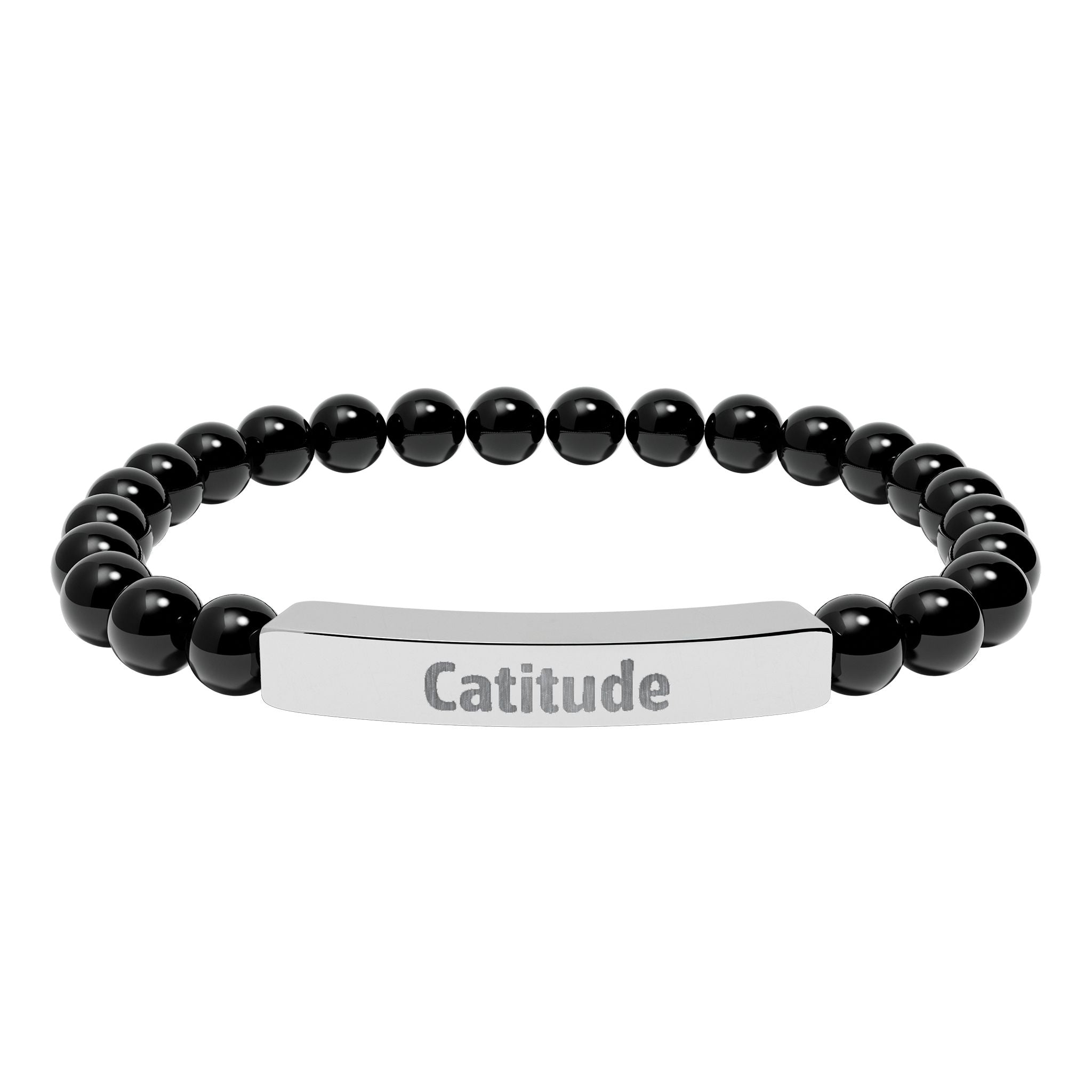 Close-up of the engraved stainless steel bar on the bracelet
