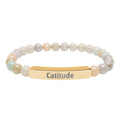 Catitude bracelet displayed on a flat surface with beads visible