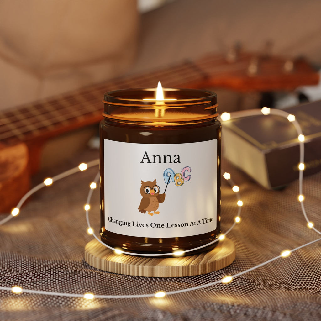Close-up of the owl and alphabet illustration on the candle label