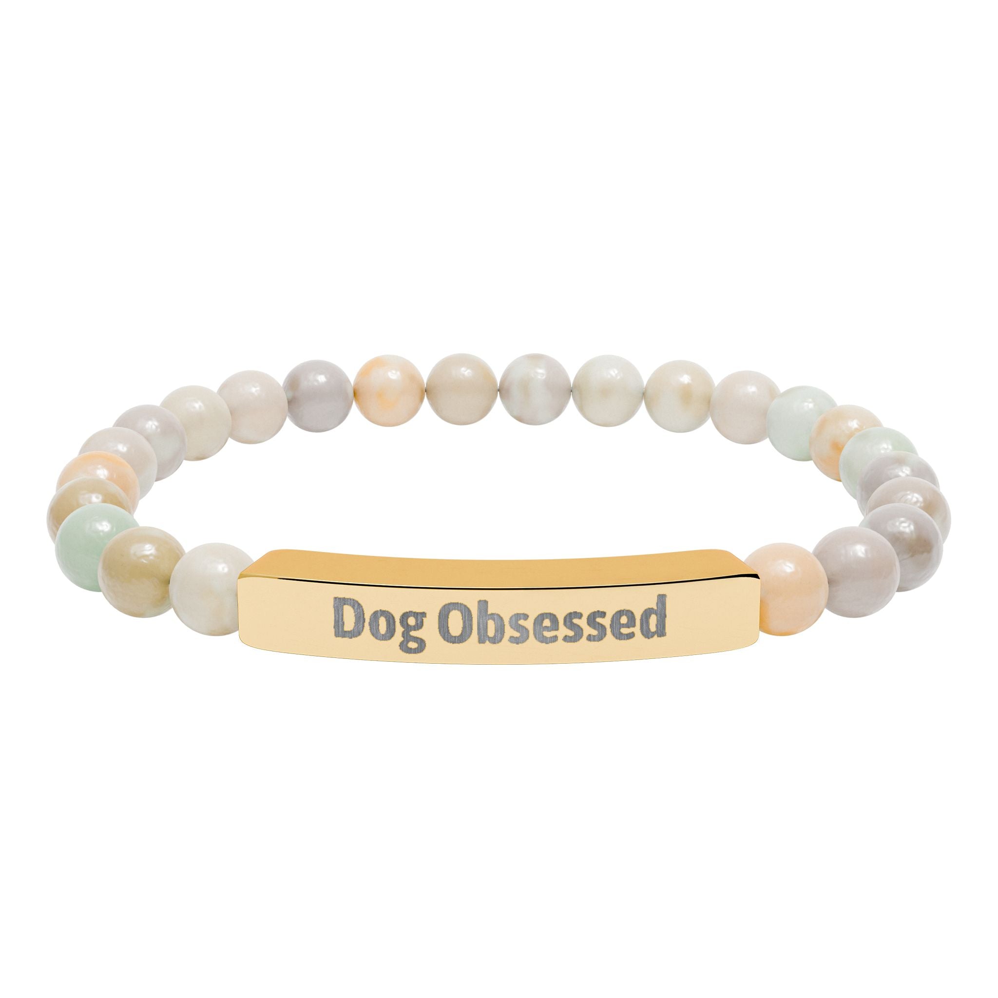 Dog Obsessed bracelet displayed on a flat surface with beads visible