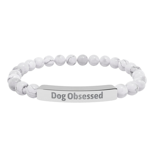 Dog Obsessed bracelet worn on a wrist