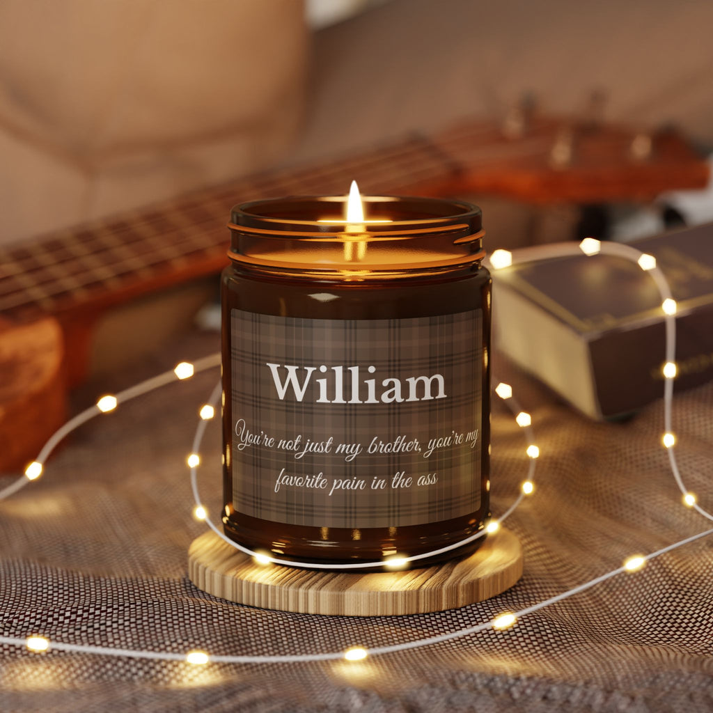 Close-up of tartan plaid candle label with personalised name in elegant white script