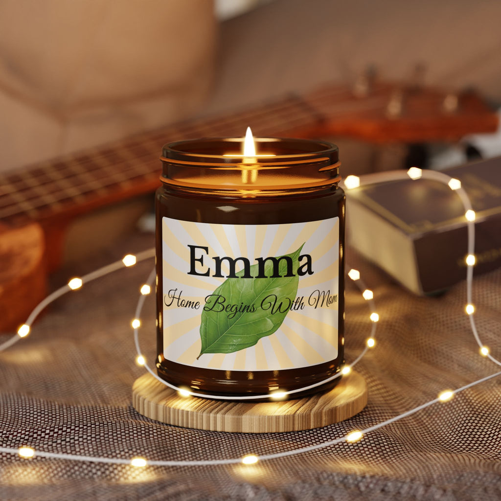 Close-up of sunburst candle label with bold name typography and leaf design