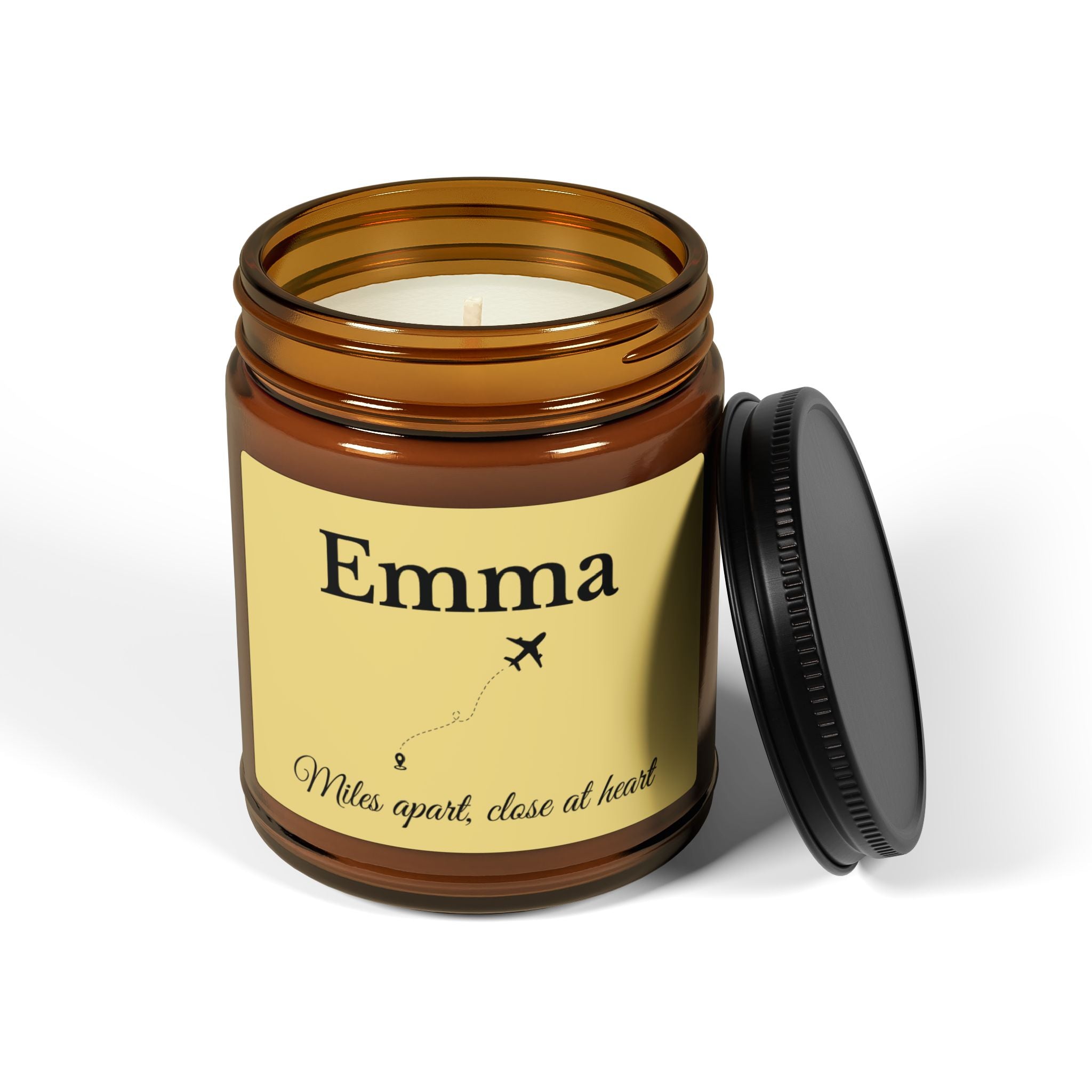 Personalised long distance candle shown in a cosy home setting