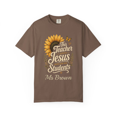 Close-up of sunflower artwork and custom name on teacher t-shirt