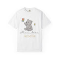Close-up of baby bear and rainbow butterfly artwork on mama t-shirt