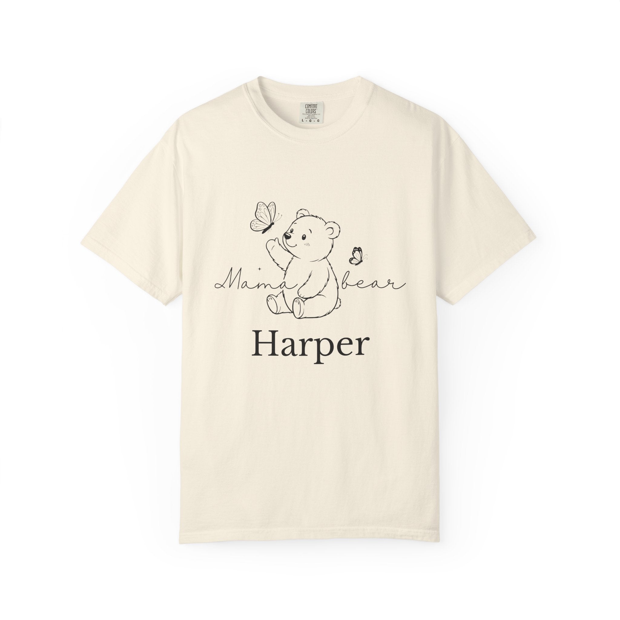 Close-up of hand-drawn baby bear artwork on mama t-shirt