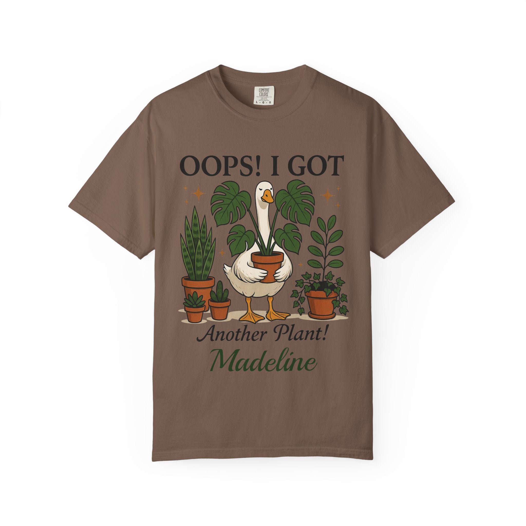 Close-up of goose and houseplant artwork on t-shirt
