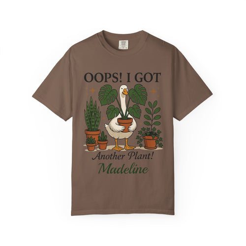 Close-up of goose and houseplant artwork on t-shirt