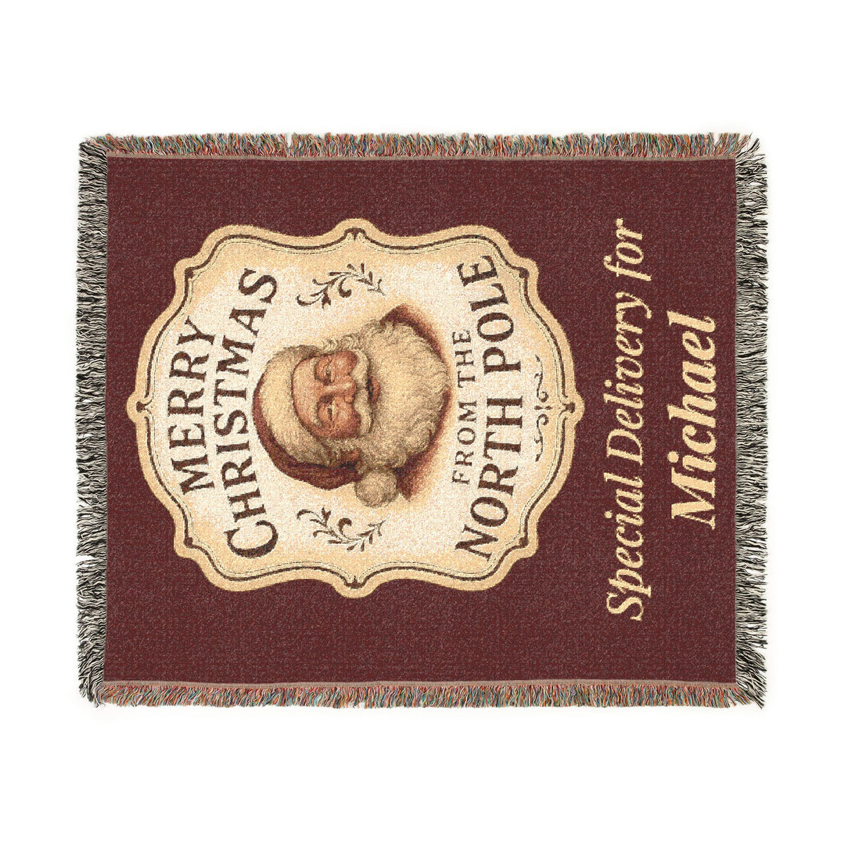 Special Delivery Santa woven throw blanket shown draped on couch