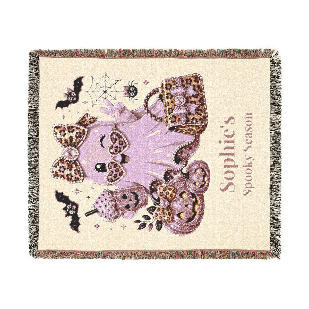 Spooky Season glam ghost woven throw blanket shown draped on couch