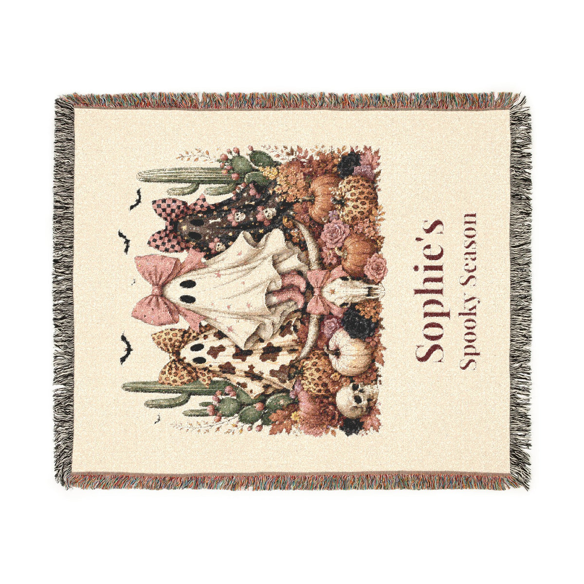 Spooky Season vintage ghost woven throw blanket shown draped on couch