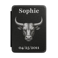 Personalized Taurus zodiac Kindle case with engraved bull design, name and birth date