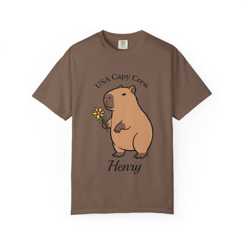 Close-up of capybara holding a flower on t-shirt
