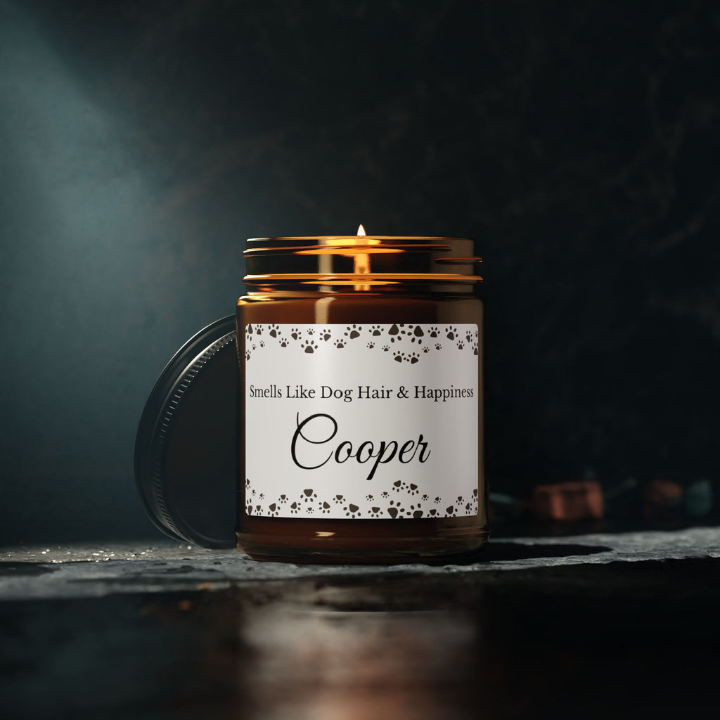 Dog lover candle displayed on a console table with a paw print border
