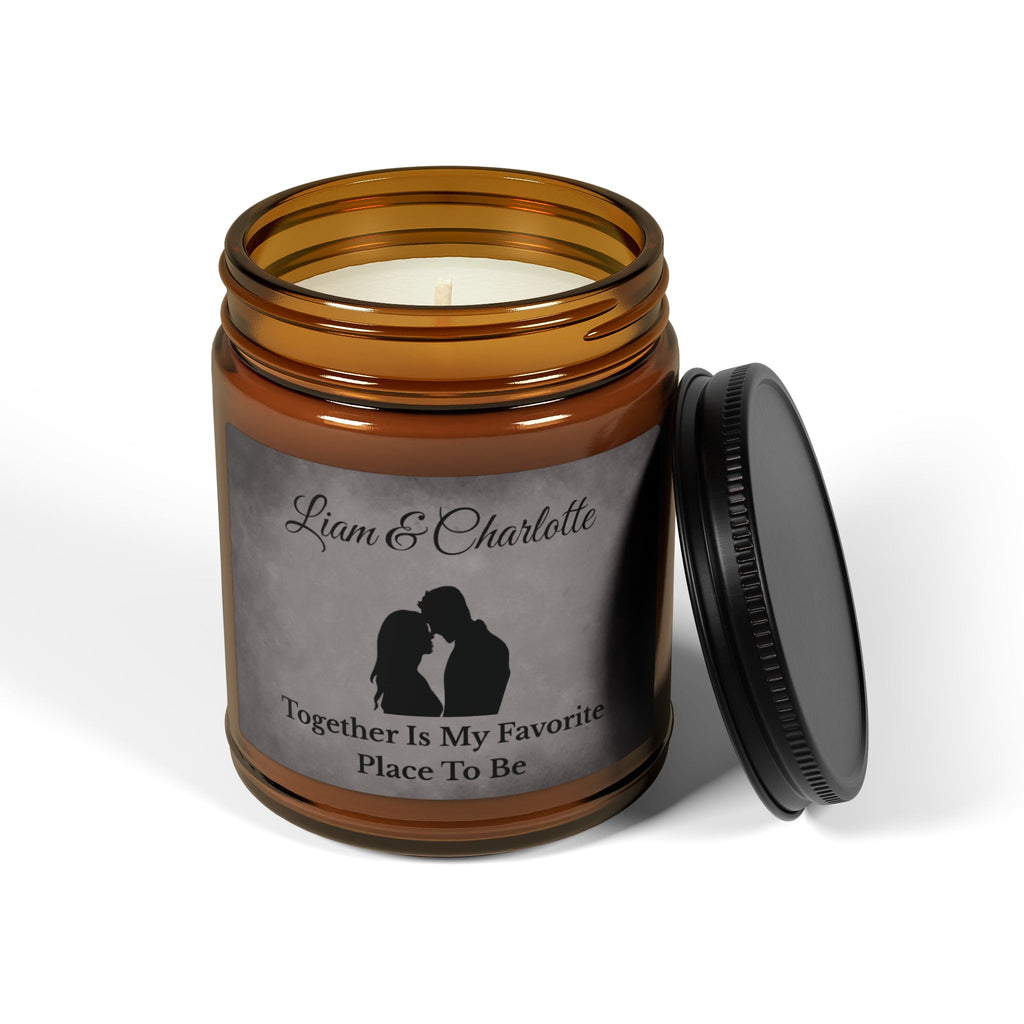 Close-up of grey marble candle label with couple silhouette and both names personalised