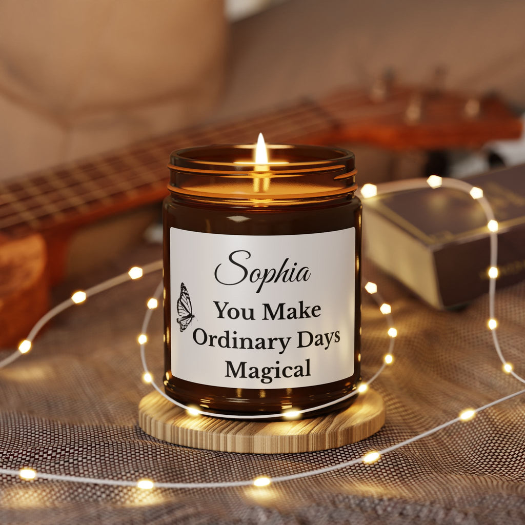 Close-up of personalised candle label with script name and monarch butterfly illustration